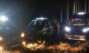 Pojazdy Policji i Straży Pożarnej w lesie