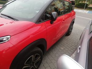 Uszkodzony pojazd marki citroen w kolorze czerwonym