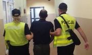 Zatrzymany prowadzony przez policjantów