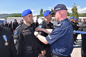 Uroczystość odznaczenia policjantów XXV rotacji JSPP