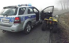 radiowóz oznakowany Policji i quad
