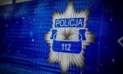 policyjna odznaka i napis Policja i 112