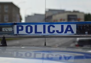 napis: policja na radiowozie