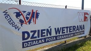 baner z napisem dzień weterana działań poza granicami państwa