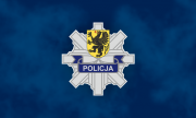 gwiazda policyjna z herbem województwa pomorskiego na granatowym tle