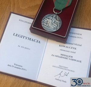 Medal oraz legitymacja