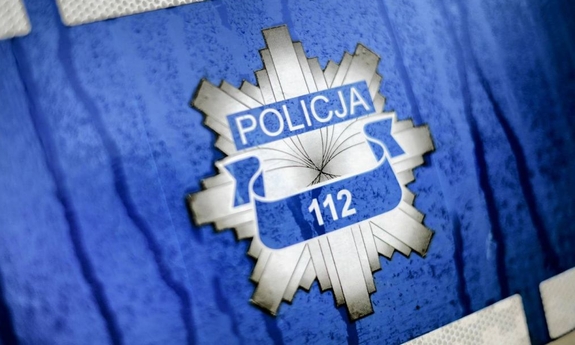 gwiazda policyjna z napisem policja na radiowozie