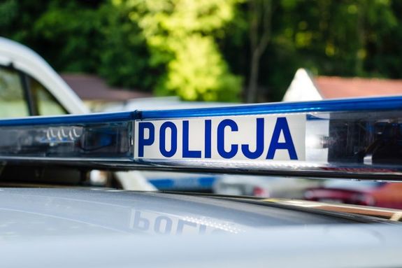 napis: Policja na radiowozie