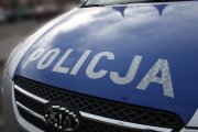 napis: Policja na radiowozie