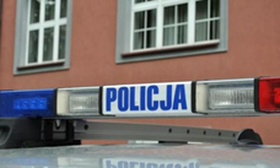Napis Policja na dachu radiowozu