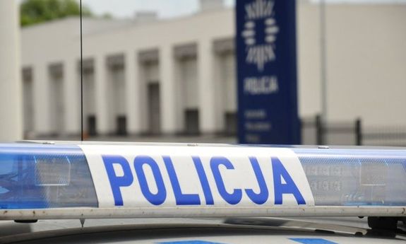 napis: policja na radiowozie