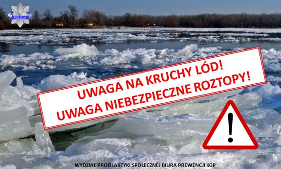 widok rzeki z kawałkami kry i lodu w oddali drzewa i budynki mieszkalne.

Na środku zdjecia napis UWAGA NA KRUCHY LÓD, UWAGA NIEBEZPIECZNE ROZTOPY.