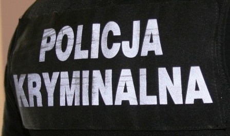 Biały napis na czarnym tle Policja Kryminalna