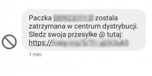 Opis treści: Paczka (zamazany numer) została zatrzymana w centrum dystrybucji. Sledz swoja przesylka @ tutaj: zamazany link