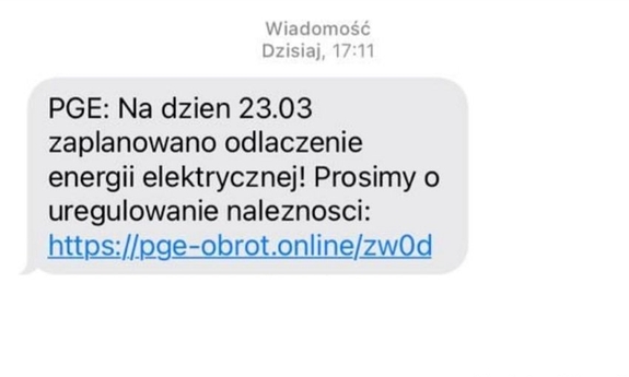 fałszywy sms z linkiem od oszusta internetowego