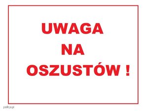 czerwony napis na białym tle uwaga na oszustów