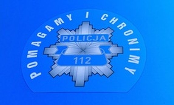 Maska radiowozu z napisem - pomagamy i chronimy i logo policji