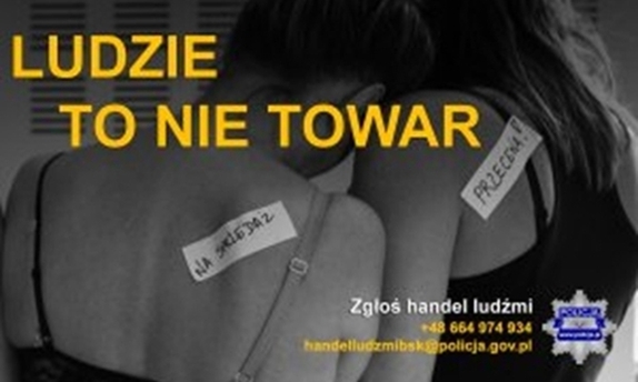 grafika z napisem ludzie to nie towar, w tle dwie kobiety odwrócone plecami