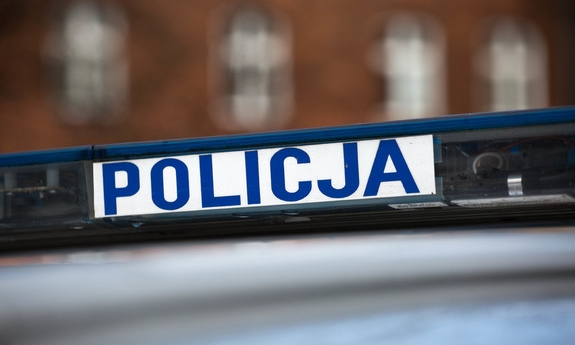 sygnalizator na radiowozie z napisem Policja