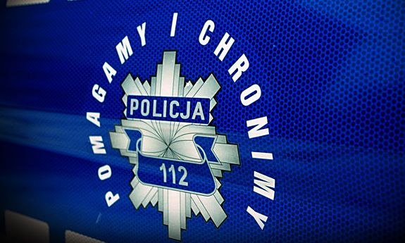 napis na drzwiach radiowozu.