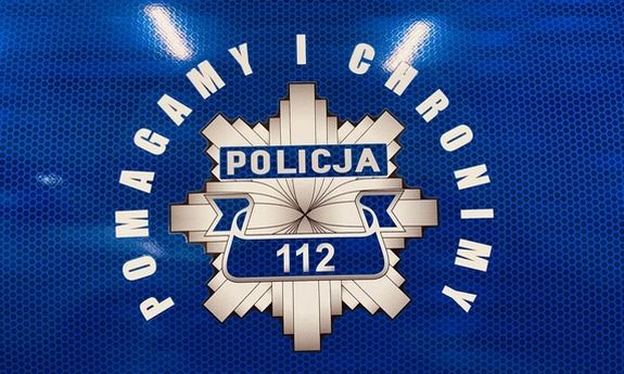 Gwiazda policyjna a wokół niej napis: pomagamy i chronimy.