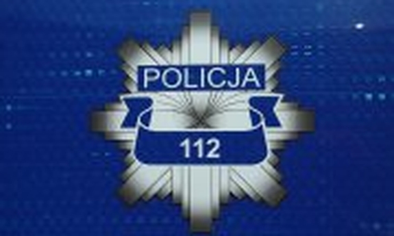 Stylizowana odznaka policyjna.