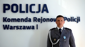 Wyróżniony policjant.