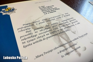 Podziękowania zapisane na ozdobnej kartce.