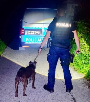 Policjant  z psem.