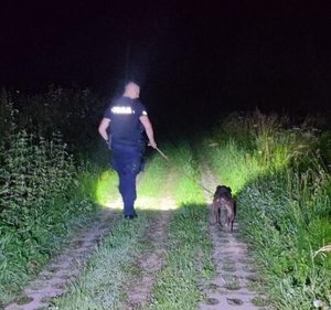 Policjant  z psem.