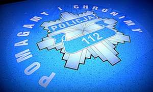 odznaka policyjna. numer 112.