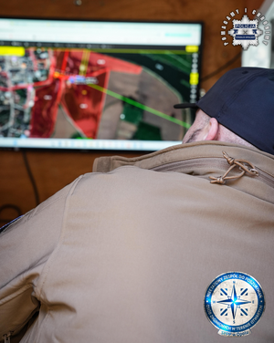 Policjanci na miejscu poszukiwań.