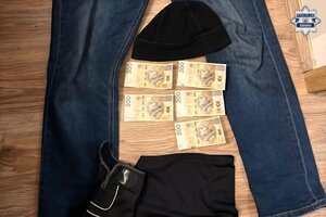 Zabezpieczone rzeczy: spodnie jeansowe, 5 banknotów 200-złotowych.
