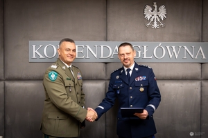 Komendant Główny Policji gen. insp. Marek Boroń oraz Komendant Główny Straży Granicznej gen. dyw. SG Robert Bagan.